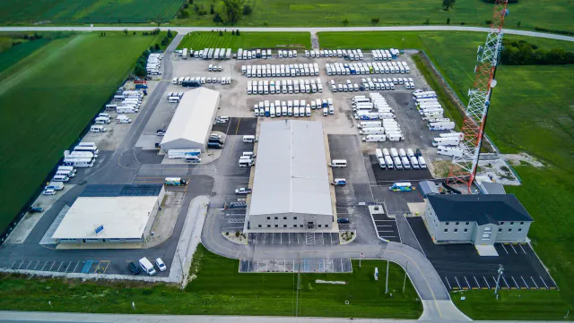 Aerial view of TESCO's second Oregon, Ohio facility with rows of new buses and vans