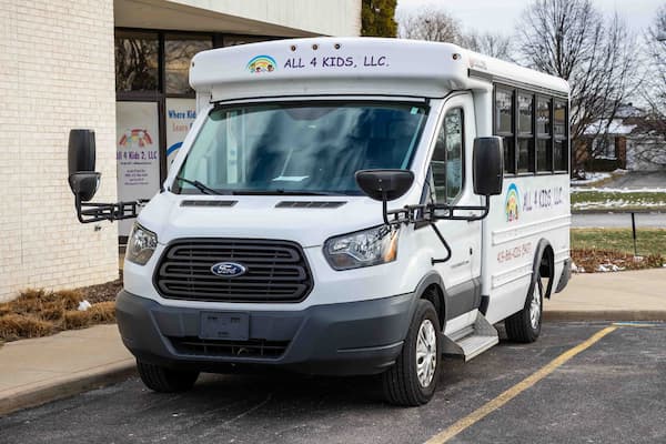 TESCO child care bus features including seat belts and safety equipment