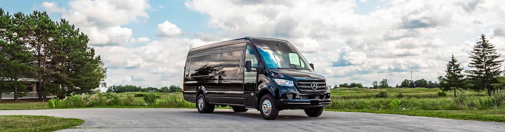 Black Mercedes-Benz Sprinter luxury hotel shuttle