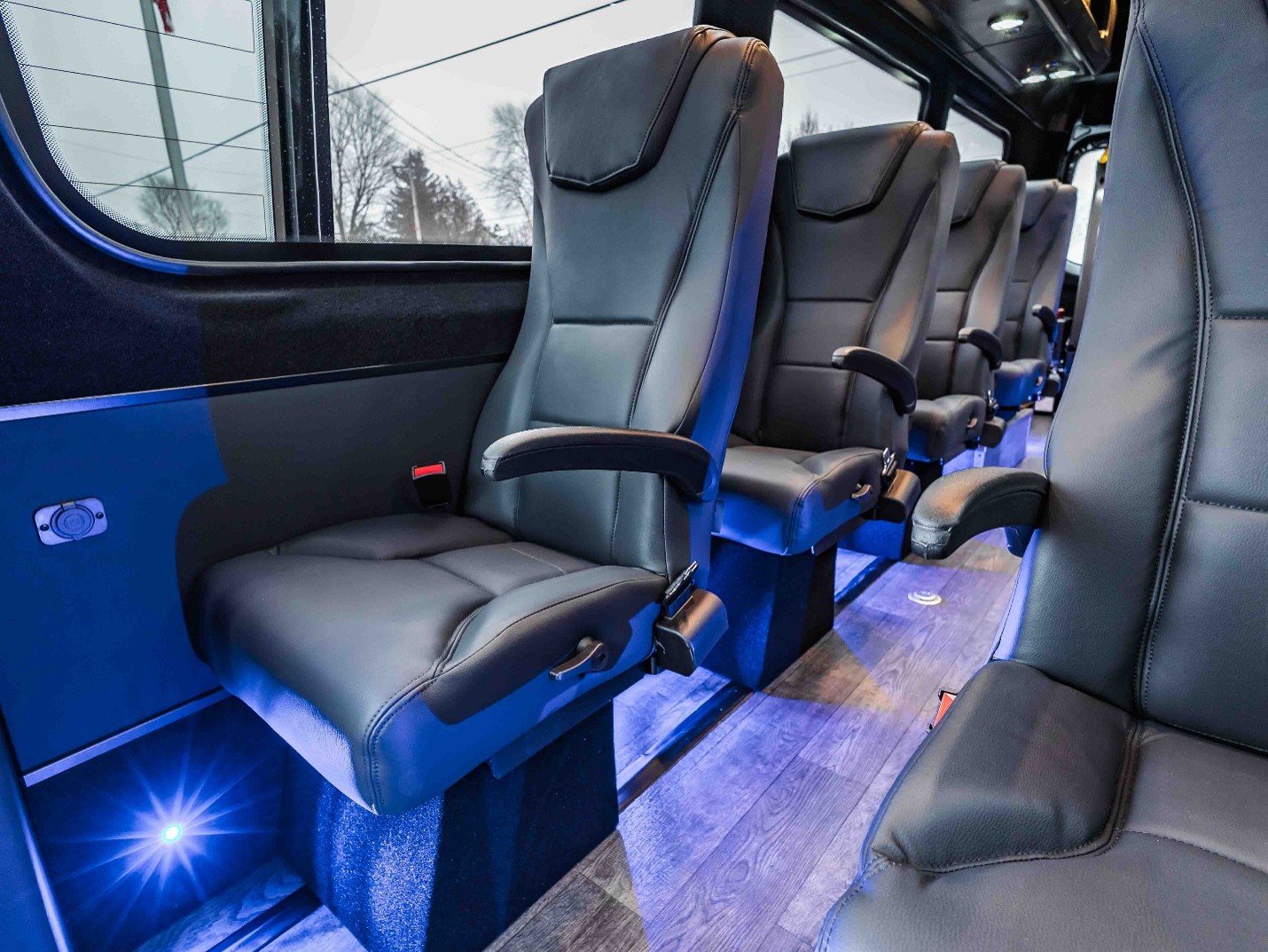 Driver cockpit and dashboard of a Mercedes-Benz Sprinter luxury shuttle